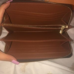 LV zippy wallet- brand new never used.